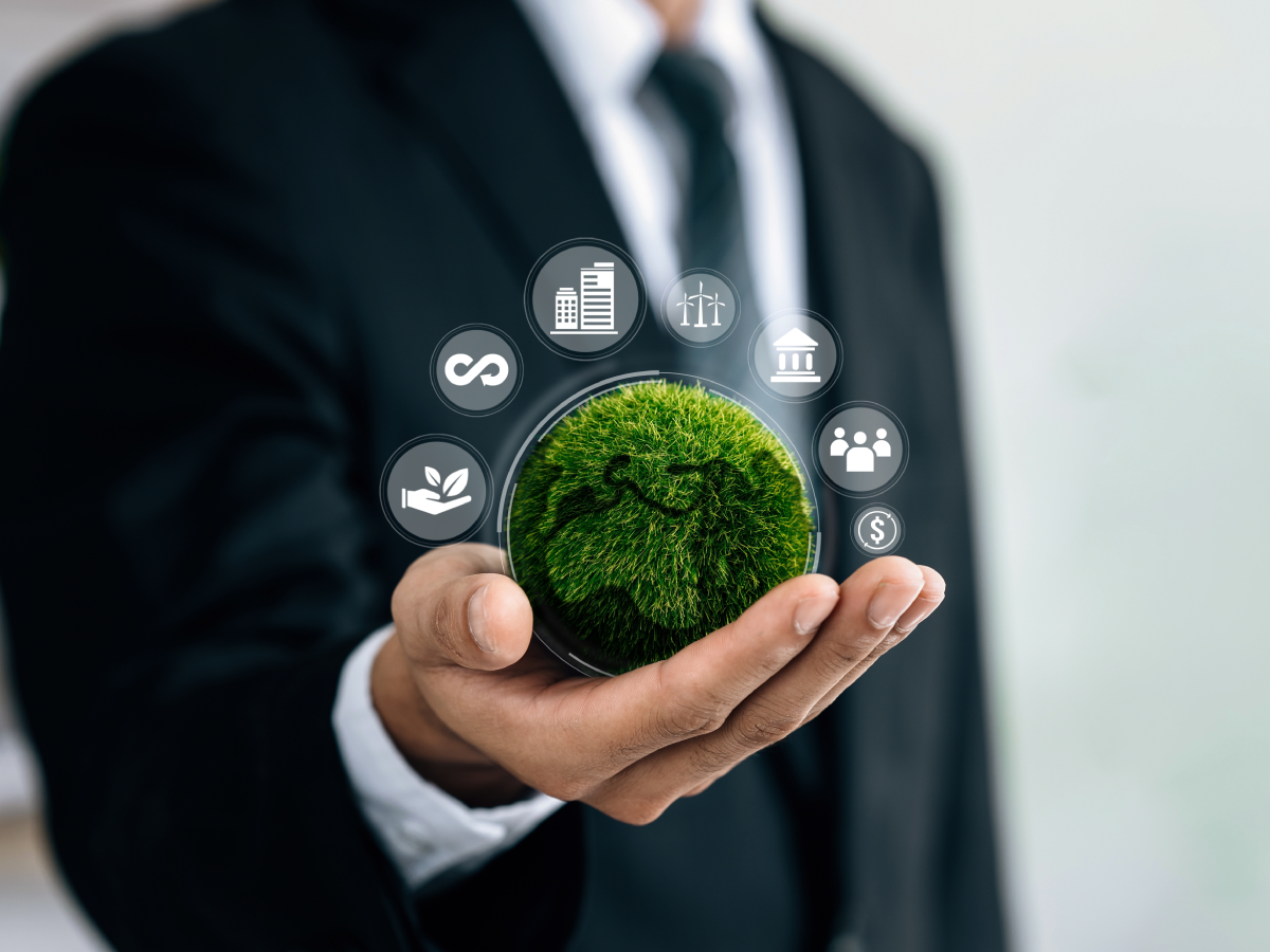 Man holding green globe